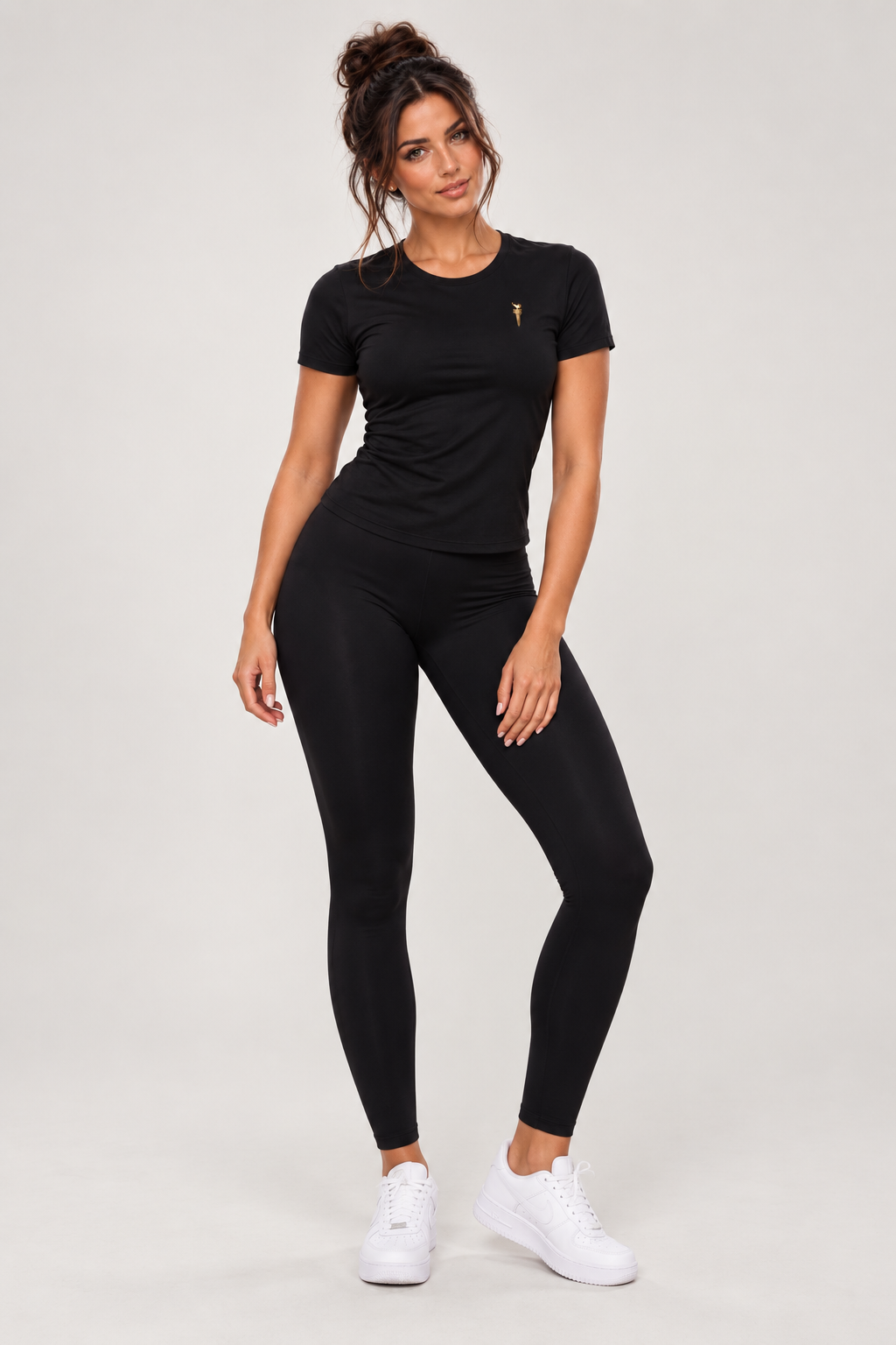 Black performance T-shirt with black full-length leggings